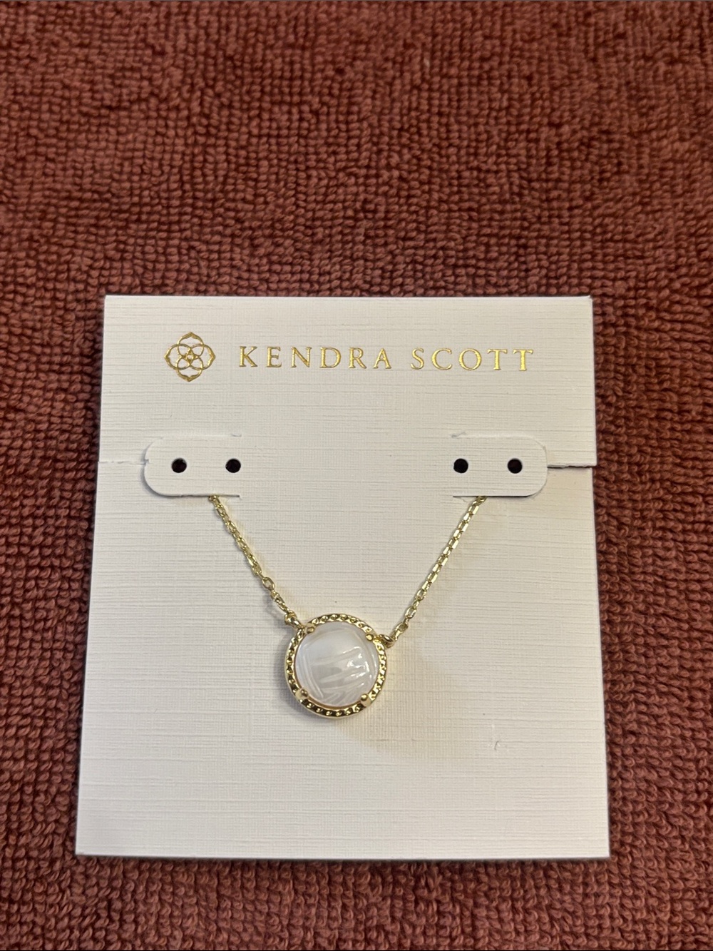Kendra Scott Gold Necklace with Mother of Pearl Volleyball Charm